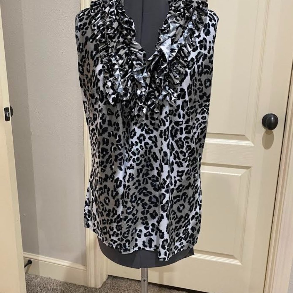 Essentials sleeveless top size L, animal print, excellent condition